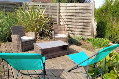 Image de Maison de vacances 'Au Nid Douillet' avec terrasse partagée, jardin partagé et Wi-Fi
