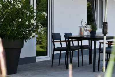 Image de Appartement 'Quartier Wellant' avec terrasse privée, jardin privé et Wi-Fi