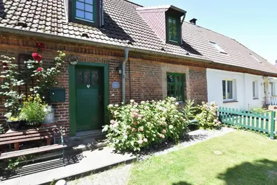Image de Maison de vacances avec cheminée et terrasse