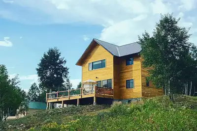 Conveniently located home with W/D, large deck & amazing views