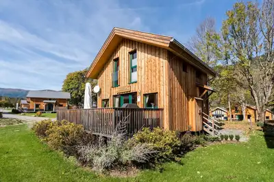 Image de Joli chalet avec borne de recharge électrique