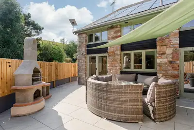 Image de Woodpeckers - Stylish luxury property with hot tub