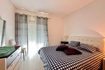 Image de Cozy 1-bedroom apartment in the Rosa Linda condominium 10 minutes from Talatona and 20 from the center