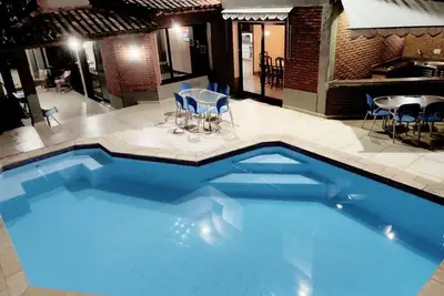 Image de Beach House Unit 3 - Guarujá Beach House 90 meters from the Beach with Swimming Pool