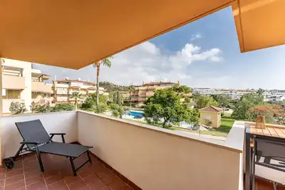 Image de Appartement '245 La Cala Los prados La Noria' avec piscine partagée, Wi-Fi et climatisation