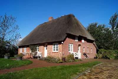 Image de Maison de vacances 'Friesenhaus Matzen' avec terrasse privée, jardin privé et Wi-Fi
