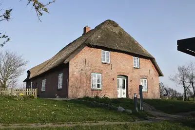 Image de Appartement 'Ferienwohnung 4 Am Westerdeich' avec terrasse privée, jardin partagé et Wi-Fi