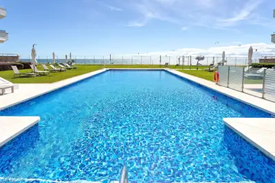 Image de Bright apartment front of beach. Guadalmansa Beach