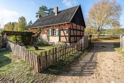 Image de Maison de campagne \"Casa Del Sol - Fachwerkhäuschen\" avec vue sur le lac, terrasse privée et Wi-Fi