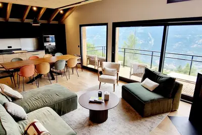 Image de Chalet neuf 5 chambres avec sauna et parking, accès direct aux pistes