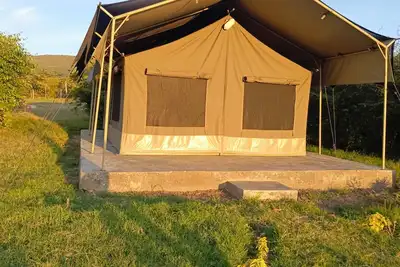 we we are located at maasaimara 1. 5 km from the main entrance\n