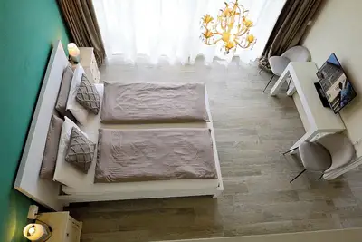 Image de Appartement 'Biancaleo Kiss The Sky' avec piscine partagée, jardin partagé et Wi-Fi