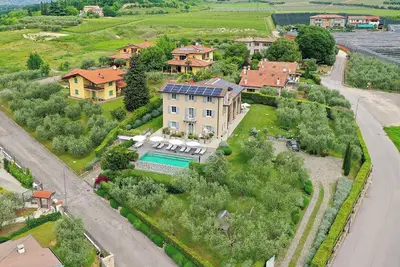 Image de Appartement 'Biancaleo Lost Paradise' avec piscine partagée, jardin partagé et Wi-Fi
