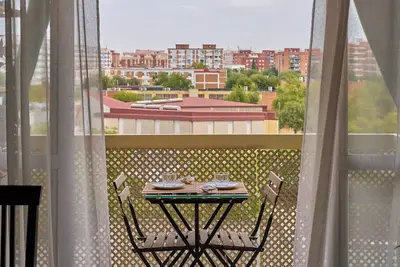 Image de Appartement 'Piso Céntrico Cerca De La Rivera' avec terrasse privée, Wi-Fi et climatisation