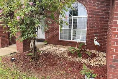 Image de Spacious 3-bedroom home with fenced backyard in  Pensacola's Perdido Key area.