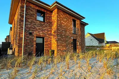 Image de New apartment, close to the beach and the North Sea, infrared sauna Quiet location!