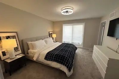 Image de Executive Townhome on Ravine wood lot