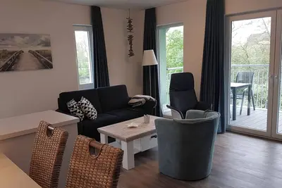 Image de Apartment with 2 bedrooms, open kitchen, living area and wellness bathroom.