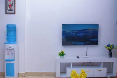 Image de Charming 1-bedroom apartment in enchanting Nairobi with WiFi \n11 minutes to Jkia
