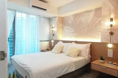 Image de Charming 2-bedroom apartment with WiFi, Ac in vibrant Parañaque