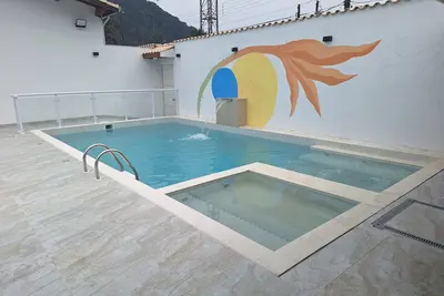 Image de House in Guaiuba Beach-Guarujá, Barbecue + swimming pool (children's/adult/hydro)