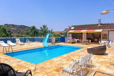 Image de Refúgio confortável c piscina e lazer completo
