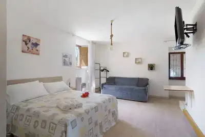 Image de Chambre d'hôtes 'Camera Aaron In Villa Vista Mare' avec terrasse partagée et Wi-Fi