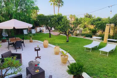 Image de Maison de vacances 'Appartement Vue Jardin' avec terrasse privée et climatisation