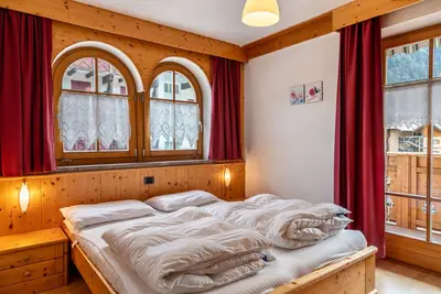 Image de Appartement \"Sassolungo\" avec vue sur les montagnes, balcon et Wi-Fi