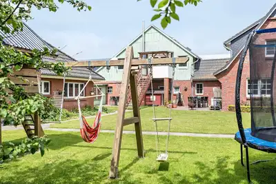 Image de Appartement 'Fewo Ingrids Ferienhof' avec terrasse privée, jardin partagé et Wi-Fi