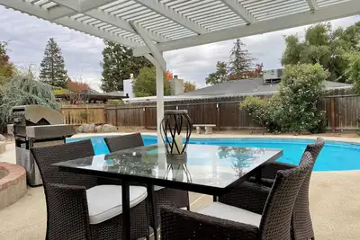 Image de House with a pool next to River Park