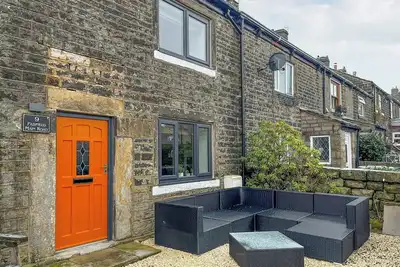 A pretty, two-bedroom house sitting close to numerous trails and the Pennine Way.