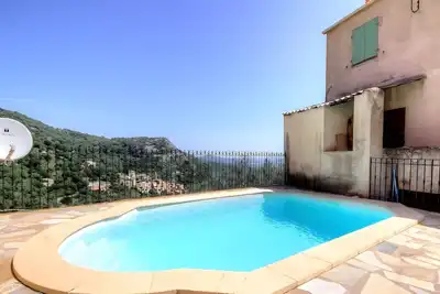 Image de Graziosa Villetta avec vue sur la montagne, piscine partagée et climatisation