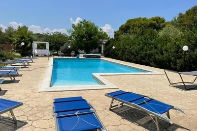 Appartement 'Casa Federico' avec piscine partagée, terrasse privée et climatisation