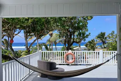 Spacious 5 bedroom home, ocean front Rarotonga! Sleeps 12. With kids playground,