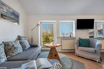 Image de Appartement 'Ferienwohnung 1' avec terrasse privée, jardin partagé et Wi-Fi
