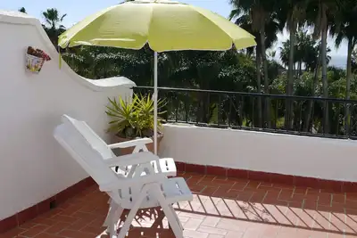 Image de A 3 bedroom house in Oasis de Capistrano with sea view.