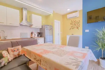 Image de Appartement idyllique à seulement 250 mètres de la plage avec terrasse, parasol, WiFi