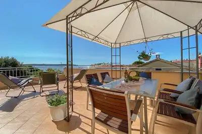 Image de Appartement de rêve à 120 mètres de la plage avec vue sur la mer, chaises longues, climatisation, WiFi