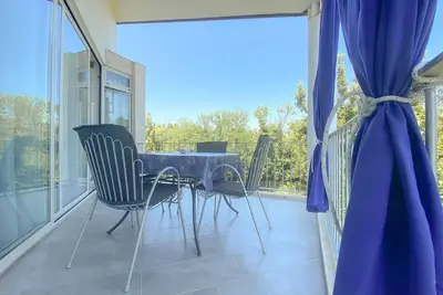 Image de A seulement 80 mètres de la mer bleue Adriatique avec balcon privé, climatisation, WiFi