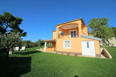 Image de Charmante maison de vacances avec vue sur la mer, 2 vélos, barbecue, chaise longue, balcon privé