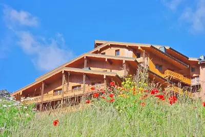 Image de Ski aux pieds | Vue imprenable + piscine