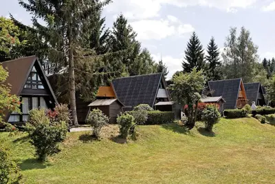 Image de Wooden Chalet With Terrace Near a Swimming Lake