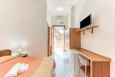 Image de Appartement 'Appartamento Lido Marini' avec vue sur mer, terrasse privée et climatisation