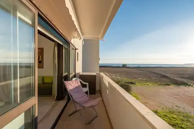 Image de Appartement 'Alvor Beach Front Line Bay' avec vue sur mer, Wi-Fi et climatisation