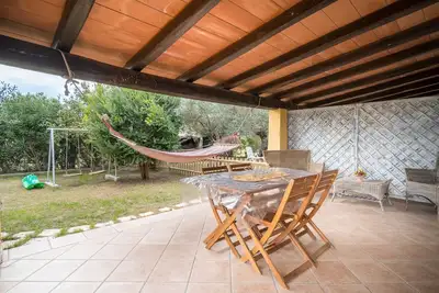 Image de Maison de vacances 'Casa Su Barone 2' avec jardin partagé, Wi-Fi et climatisation