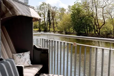 Image de First floor dream apartment with private sauna right on the water.