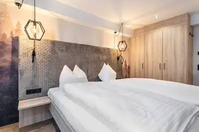 Image de Appartement \"Grauzone Grossarl App. Nr. 1 Cozy\" avec vue sur les montagnes et Wi-Fi