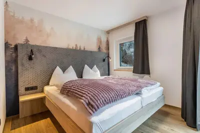 Appartement \"Grauzone Grossarl App. Nr. 3 Sun\" avec vue sur la montagne, terrasse privée et Wi-Fi
