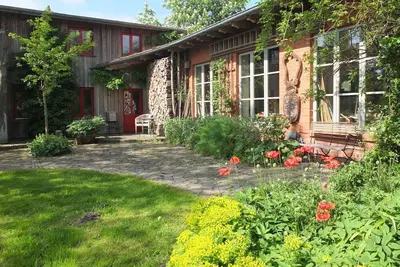 Image de Appartement 'Atelierwohnung Hof Kranichmoor' avec terrasse privée, jardin partagé et Wi-Fi